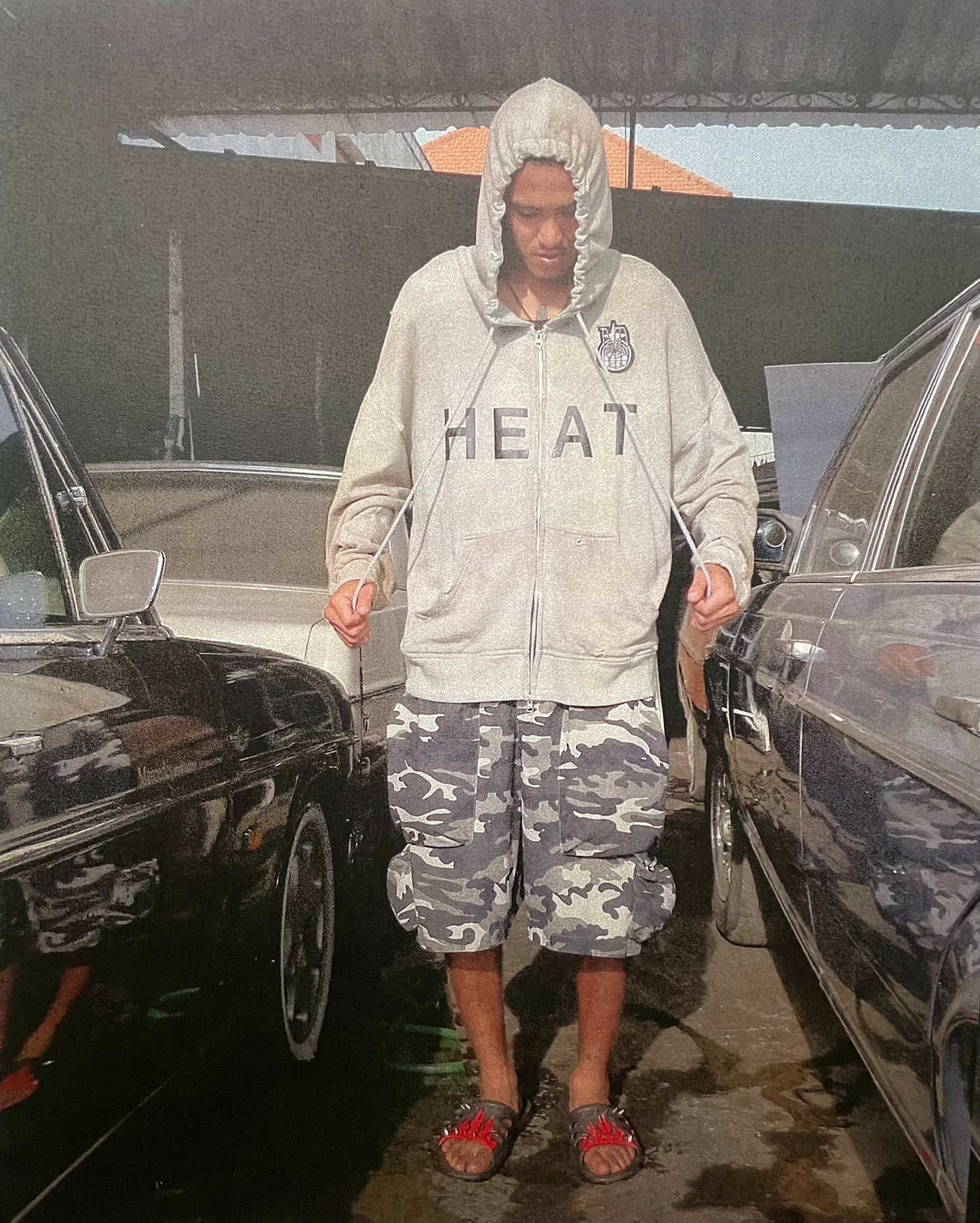 “HEAT” zip hoodie.