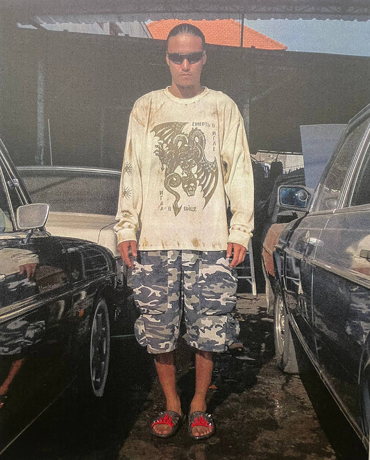 “Army” black white camouflage rip-stop shorts.